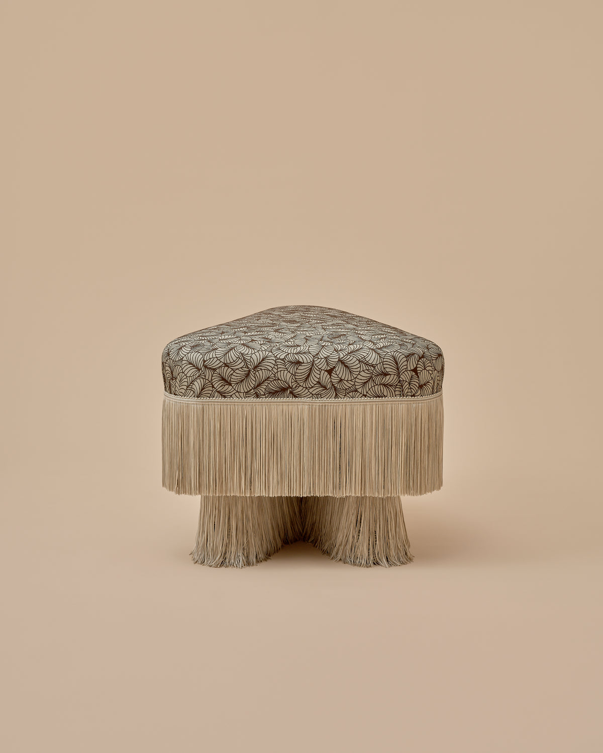 Nerova Ottoman by Love House x Spencer Malinski, side view of the fringe skirt over fringe-wrapped legs, available at Love House New York